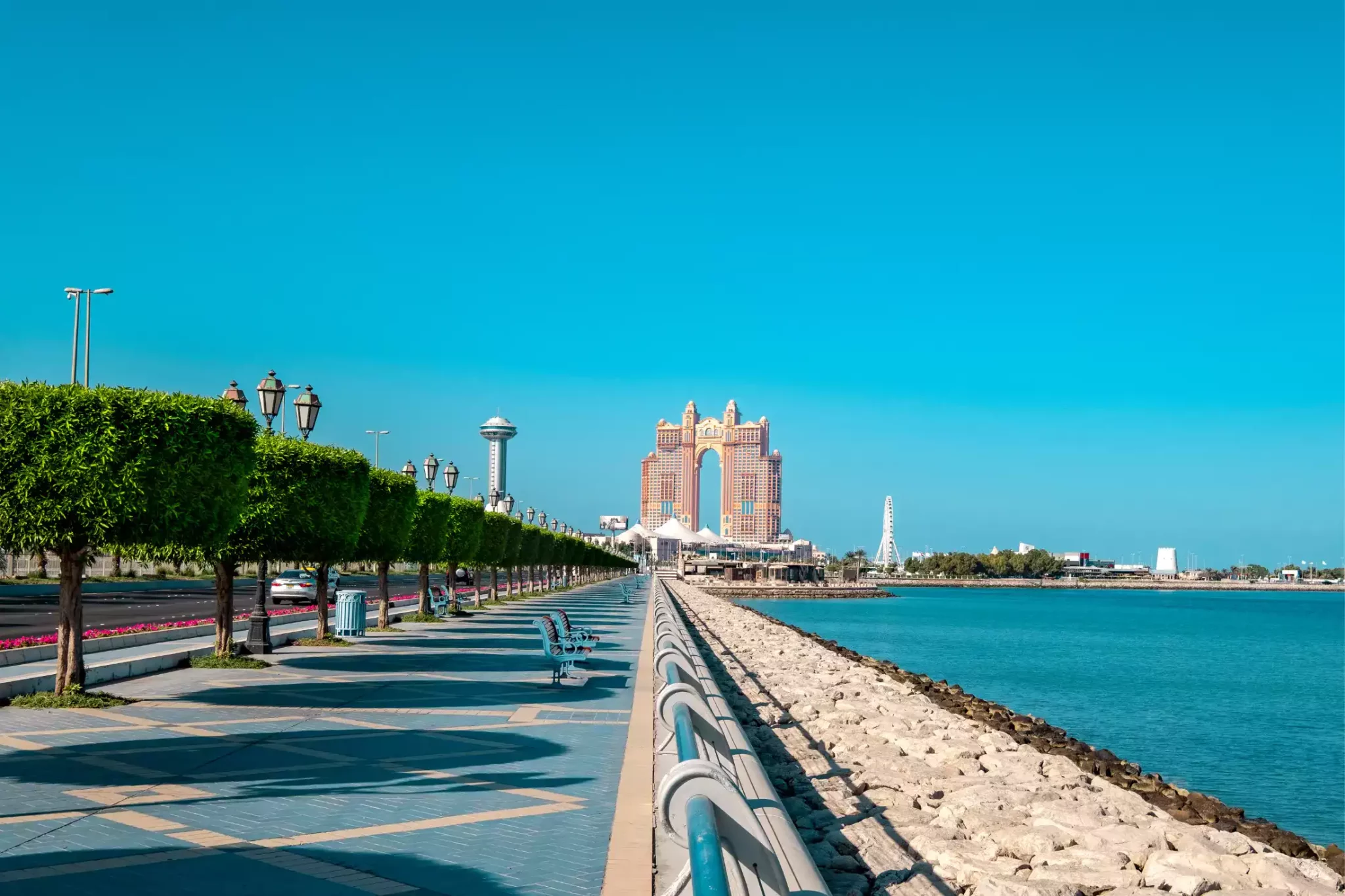 A pedestrian walkway along the sea in Corniche, one of the parks in Abu Dhabi.