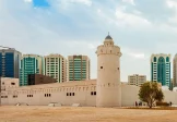 Qasr Al Hosn fort with Abu Dhabi skyline in the background