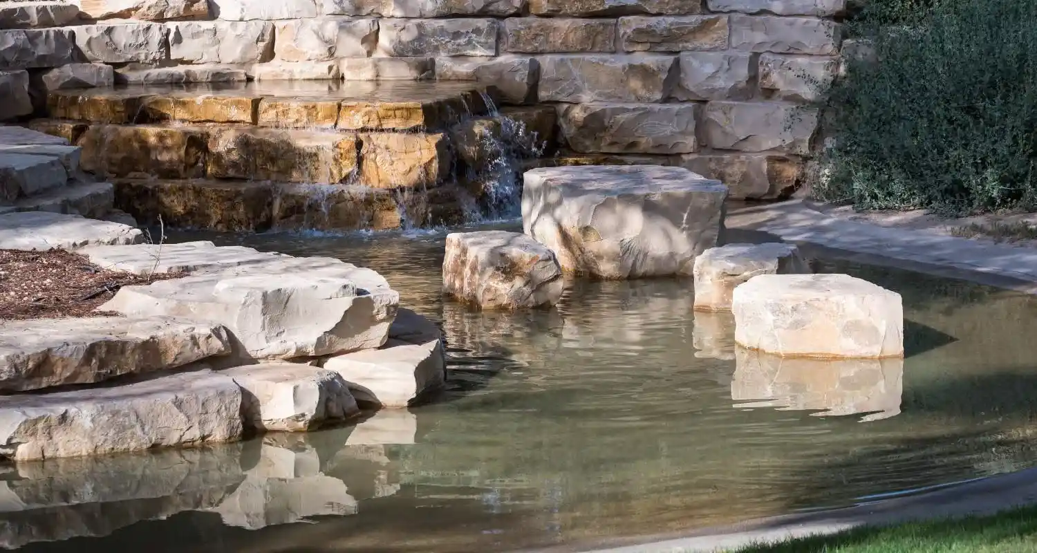 Stone water cascade in the botanic garden at Umm Al Emarat Park