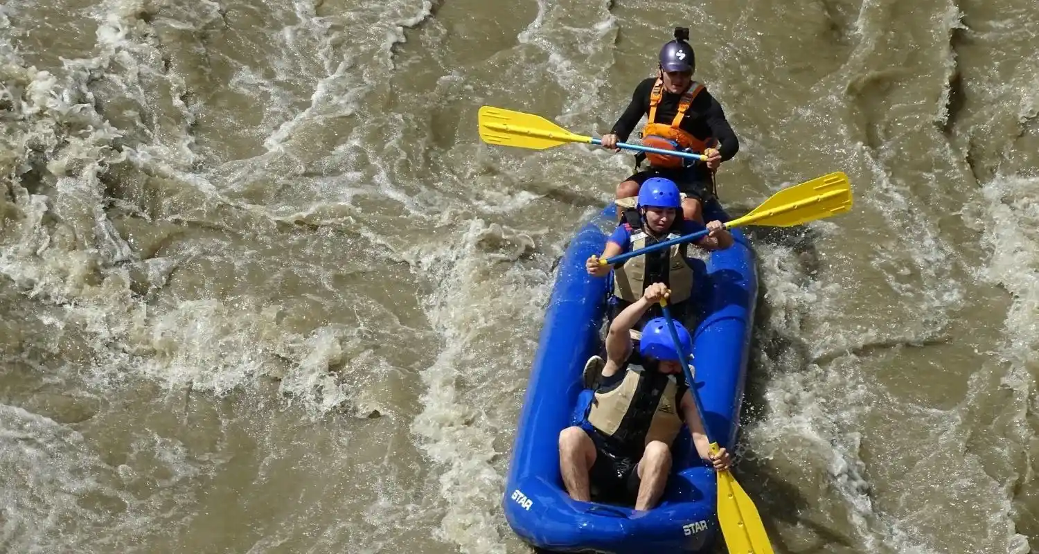 Whitewater rafting on the man-made rapids at Wadi Adventure, one of the most active things to do in Al Ain